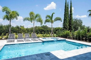 Outdoor pool, a heated pool - Brand New Luxury 6 Bed house at Reunion golf resort (Kissimmee)