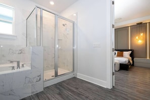 Shower, towels, soap, toilet paper
