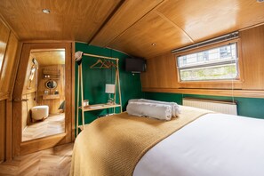 2 habitaciones, tabla de planchar con plancha y cuna de viaje 