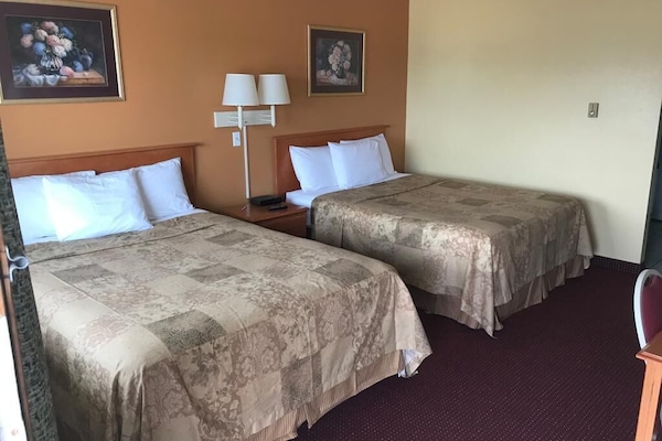 Blackout drapes, iron/ironing board, free WiFi, bed sheets