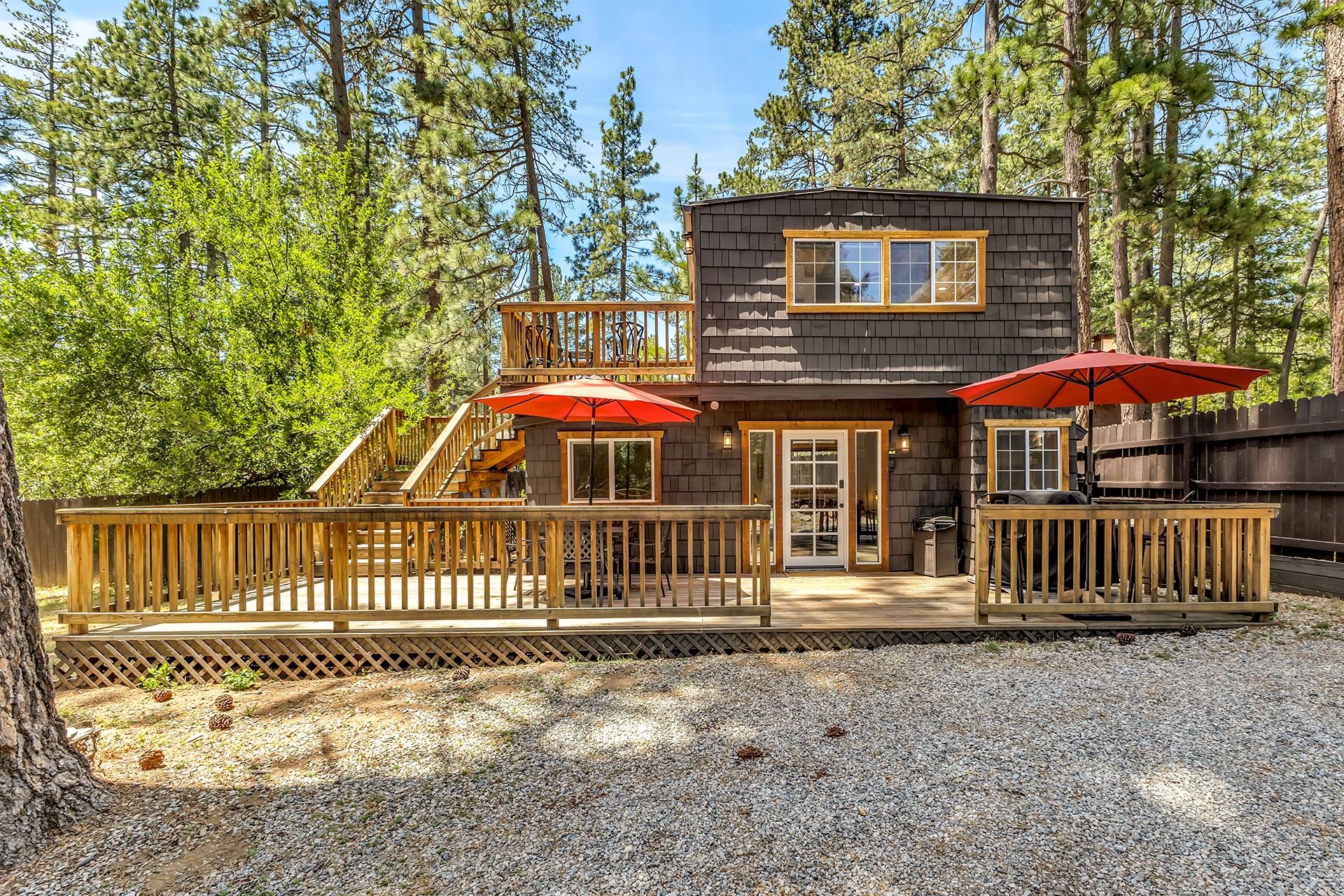 Forest cabin exterior with large deck