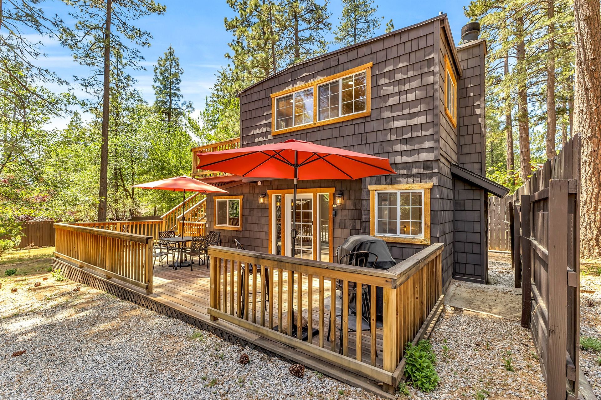 Angled exterior view with patio umbrellas
