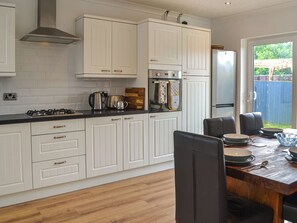 Private kitchen - You will love this spacious semi-detached dormer bungalow with enclosed garden. (Flamborough, near Bridlington)