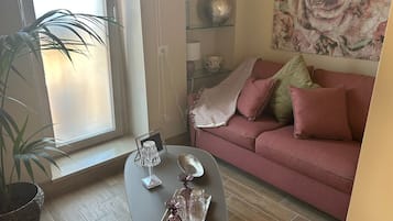 Camera Deluxe, 1 letto matrimoniale, vista città, al piano ammezzato | Area soggiorno
