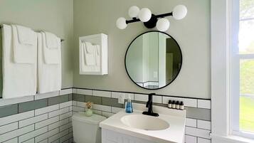 Hair dryer, towels, soap, shampoo