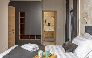 2 室のベッドルーム、旅行用ベビーベッド、WiFi (無料)、ベッドシーツ