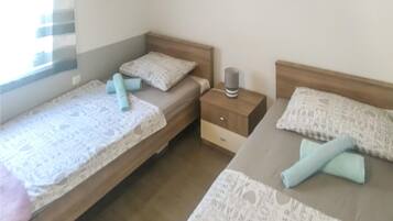 2 habitaciones, wifi gratis y ropa de cama