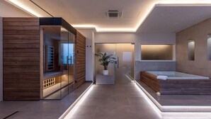 Une salle de bain moderne avec une douche à parois de verre, une grande baignoire et un meuble-lavabo en bois.