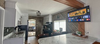 Big Bay Getaway - Outdoor sauna and extra parking for snowmobiles & trailers!