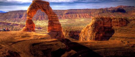 A natural rock formation with a prominent arch.