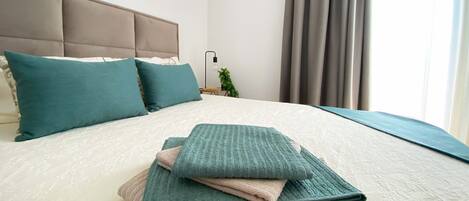 1 habitación y ropa de cama