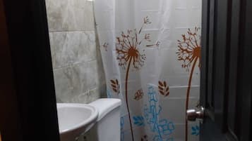Shower, towels, soap, toilet paper