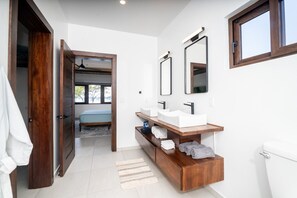 Combined shower/bathtub, hair dryer, towels, soap
