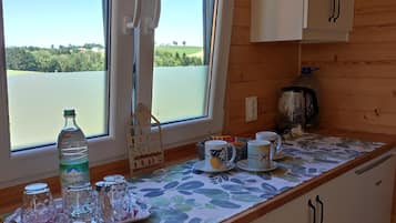 Fridge, stovetop, coffee/tea maker, electric kettle