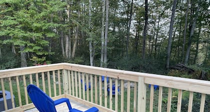 Secluded mountain home on over 10 wooded acres, modern, WiFi and pet friendly!