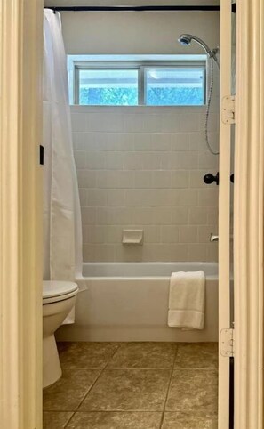 Hair dryer, towels, soap, shampoo