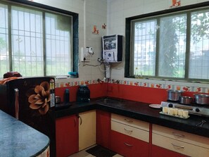 Fridge, stovetop, cookware/dishes/utensils, spices