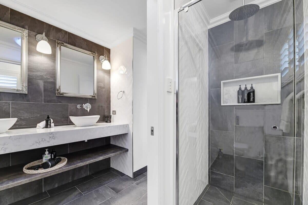 Shower, hair dryer, towels, shampoo