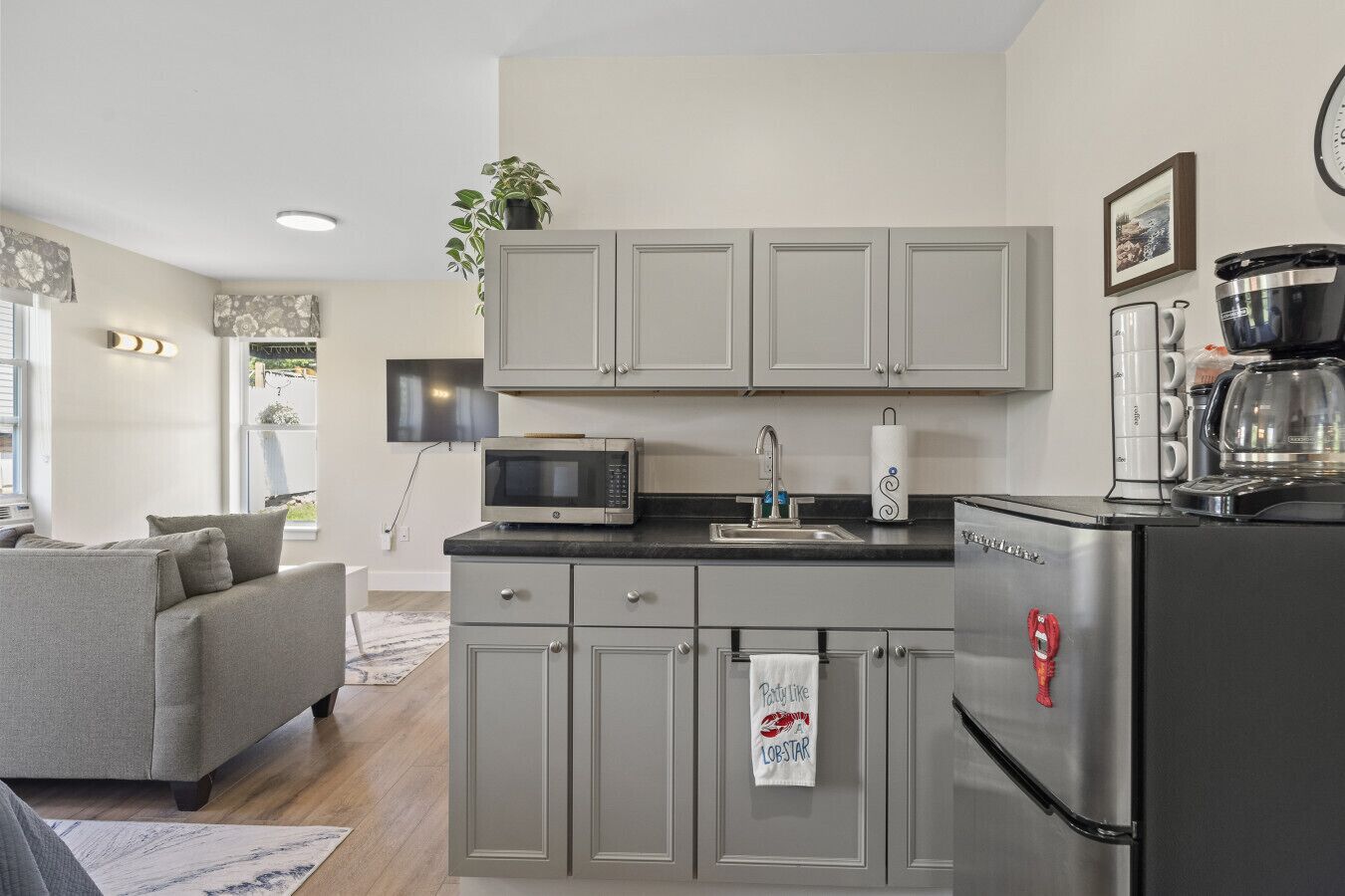 Fridge, microwave, coffee/tea maker, toaster