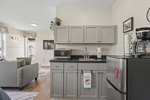 Fridge, microwave, coffee/tea maker, toaster