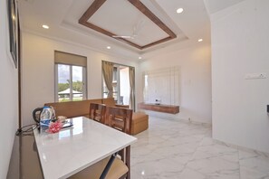 Apartment, 1 Bedroom, Balcony | Living area | 41-inch LED TV with satellite channels - OVI'S HOLIDAY (Mawal)