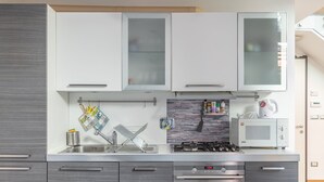 Basic Apartment | Private kitchen | Full-size fridge, microwave, oven, dishwasher - ANDREA COSTA (Bologna)
