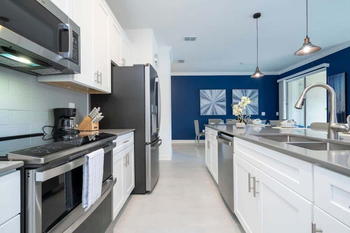 Coffee/tea maker, fridge, microwave, oven