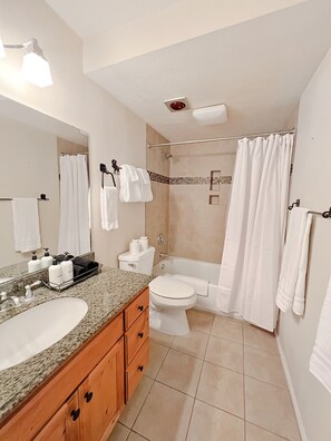 Bathtub, hair dryer, towels, soap - Steps to the Slopes | Cozy Condo + Fireplace (Park City)