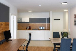 Appartamento Deluxe, 1 camera da letto, balcone | Cucina privata | Microonde, piano cottura, lavastoviglie, bollitore elettrico