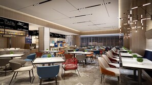 A modern restaurant with multiple dining areas, including a bar and a seating area with tables and chairs. - Holiday Inn Express Suzhou Bay (Suzhou)