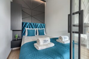 1 chambre, fer et planche à repasser, lits bébé (en supplément)