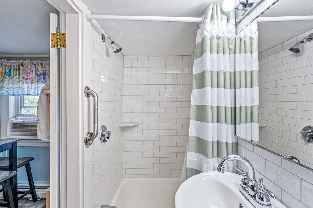Bathtub, hair dryer, towels