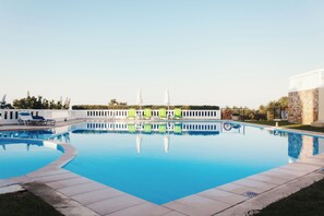 Outdoor pool, pool umbrellas, pool loungers