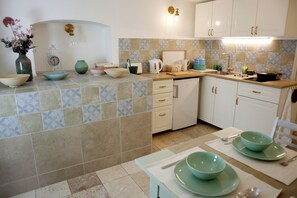 Fridge, stovetop, electric kettle, toaster