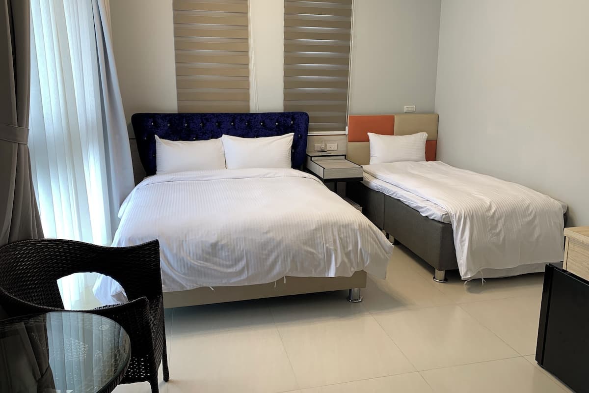 Family Triple Room, Mountain View | Blackout drapes, soundproofing, iron/ironing board, free WiFi