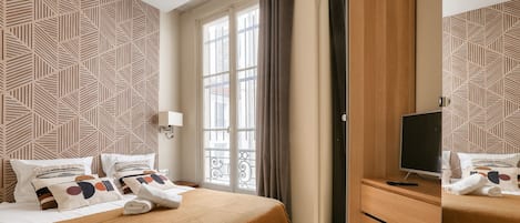 3 slaapkamers, een strijkplank/strijkijzer, gratis wifi, beddengoed