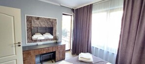 1 chambre, coffres-forts dans les chambres, fer et planche à repasser
