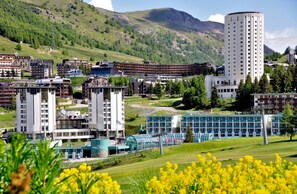 Set amidst lush green hills, this hotel complex offers a unique blend of modern and traditional architecture.