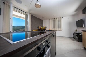 Apartment | Eigene Küche | Kühlschrank, Mikrowelle, Ofen, Herdplatte