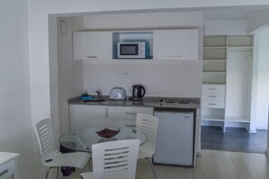 Fridge, microwave, dining tables