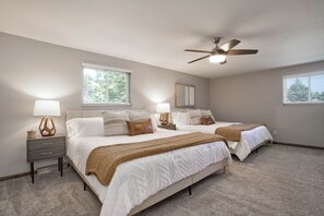 A bedroom with two beds, a ceiling fan, and two windows. - Large home inArvada, centrally located, 20min to downtown, garage parking, 420ok (Arvada)