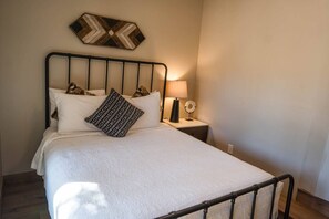 3 bedrooms, desk, iron/ironing board, travel cot