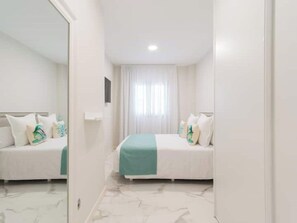 2 chambres, fer et planche à repasser, Wi-Fi, draps fournis