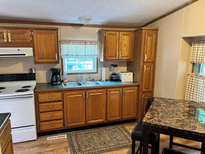 Private kitchen - 3 Bedroom 2 Bath Home in Island Club - Sleeps 8 - IC84 - Pool Access, w/ Linens (Put-in-Bay)