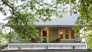 A house with a porch, a covered entryway, and a small front yard. - House in Quaint Neighborhood near Downtown Milwaukee Pet-Friendly! (Milwaukee)