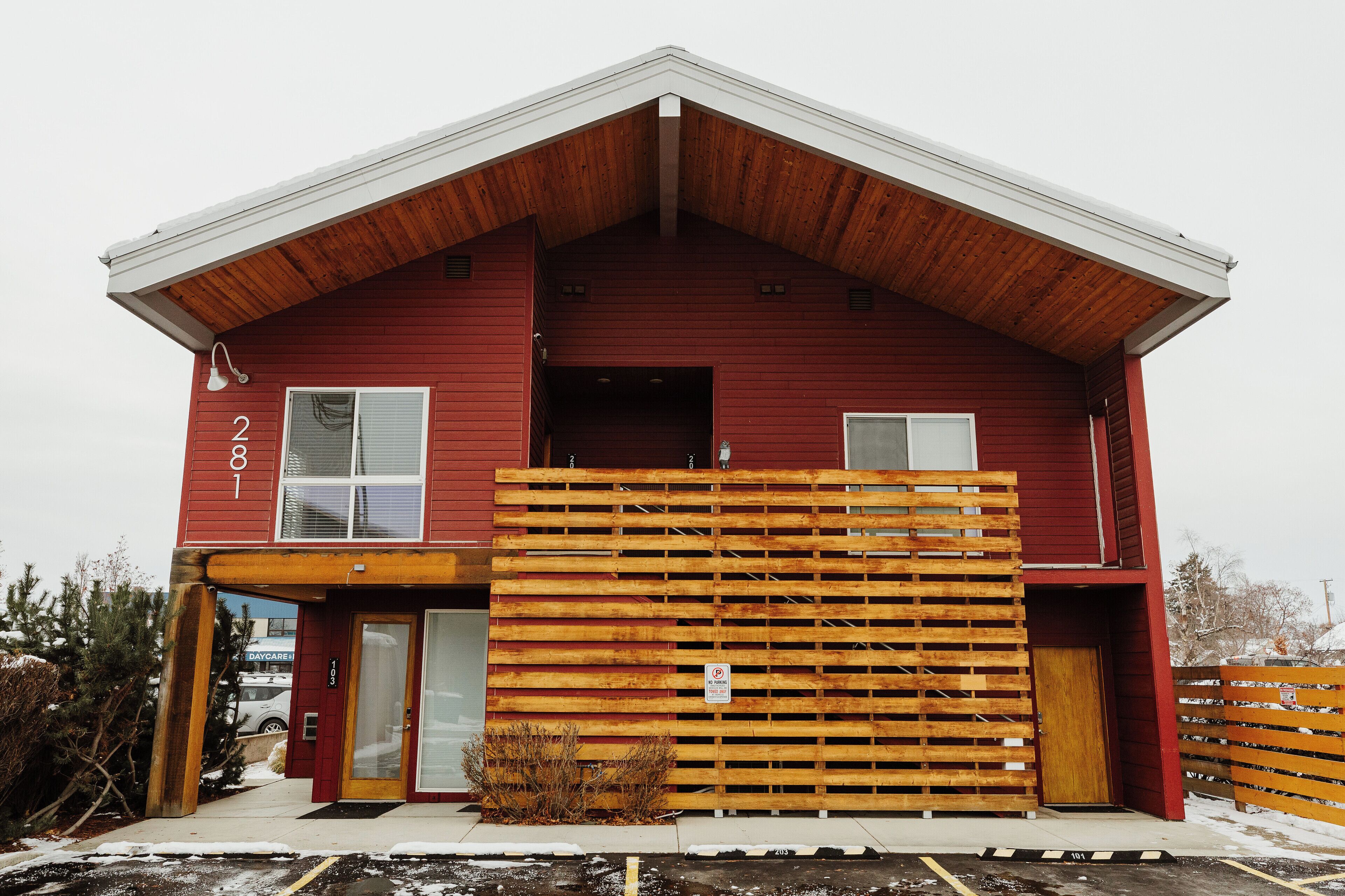 [Exterior] Mt. Stimson Suite 203 is located on the east (back) side of the property on the second story. There is a dedicated parking spot right in front of the suite.