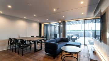 Presidential Villa | Living room | 60-inch Smart TV with digital channels, heated floors