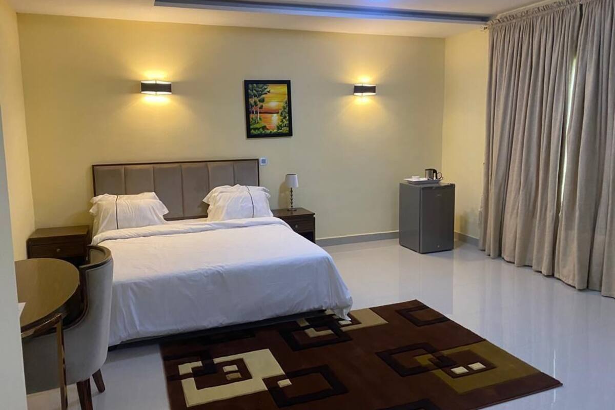 Executive Room | Blackout drapes, iron/ironing board (on request), WiFi (free)