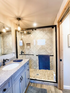 Shower, hair dryer, towels, soap