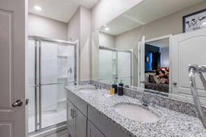 Combined shower/tub, hair dryer, towels, soap